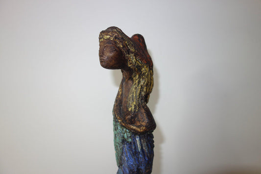 Colourful Earthenware Figurehead of an African lady on marble base