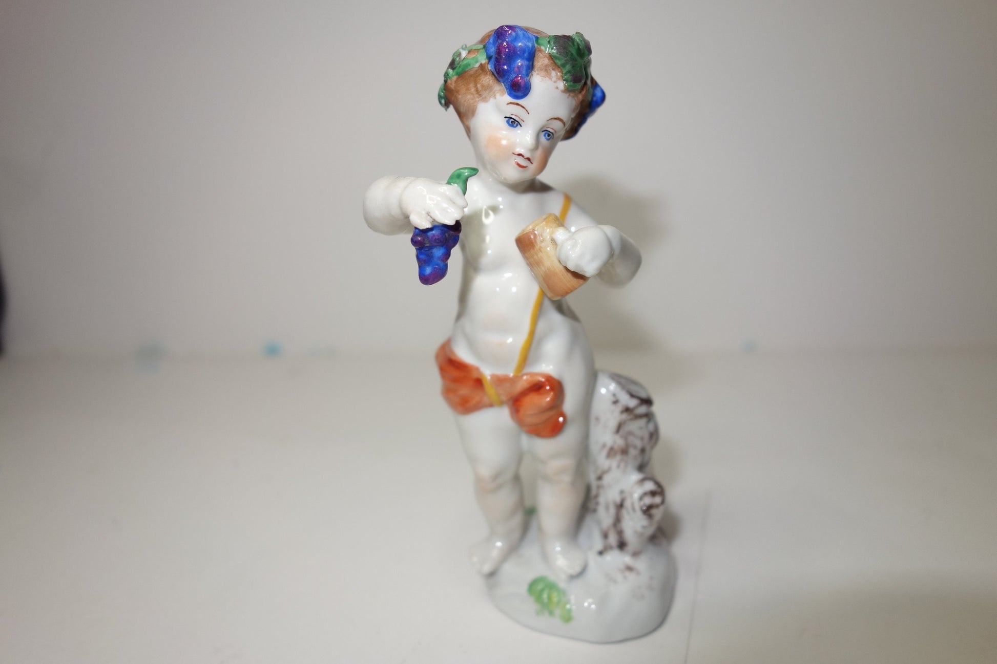 19th century German figure of the boy Bacchus