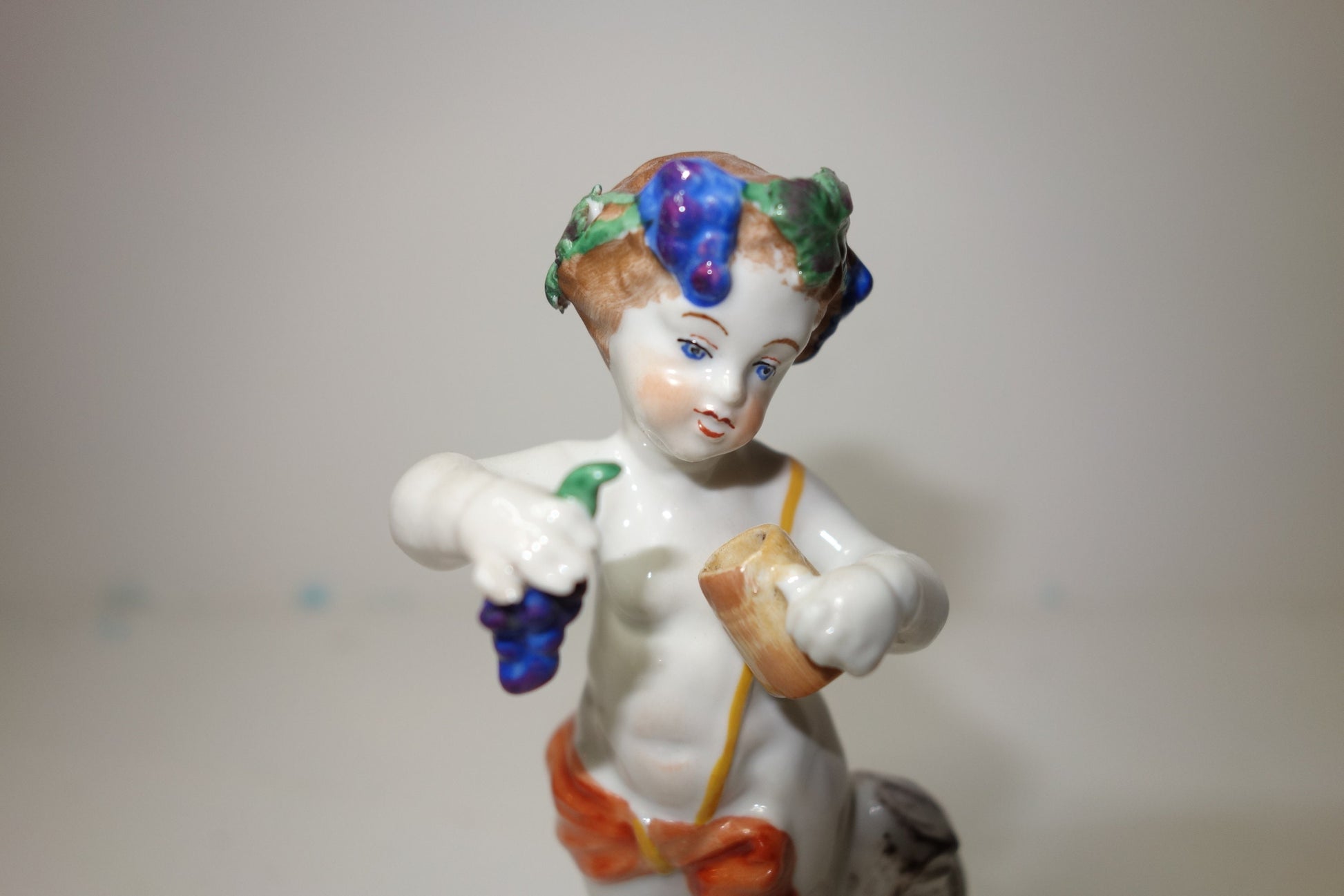 19th century German figure of the boy Bacchus