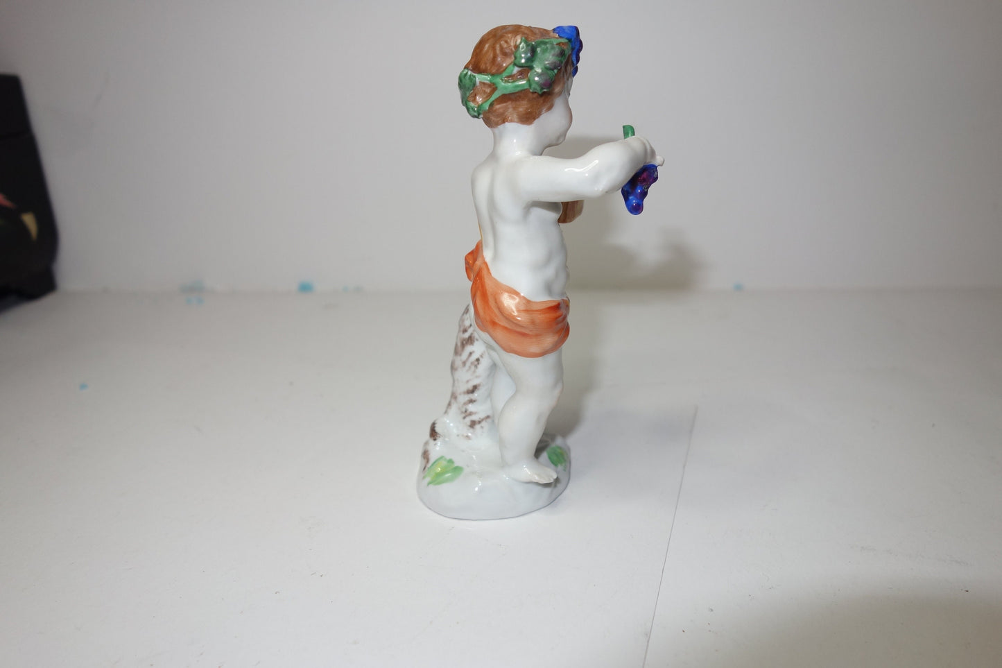 19th century German figure of the boy Bacchus