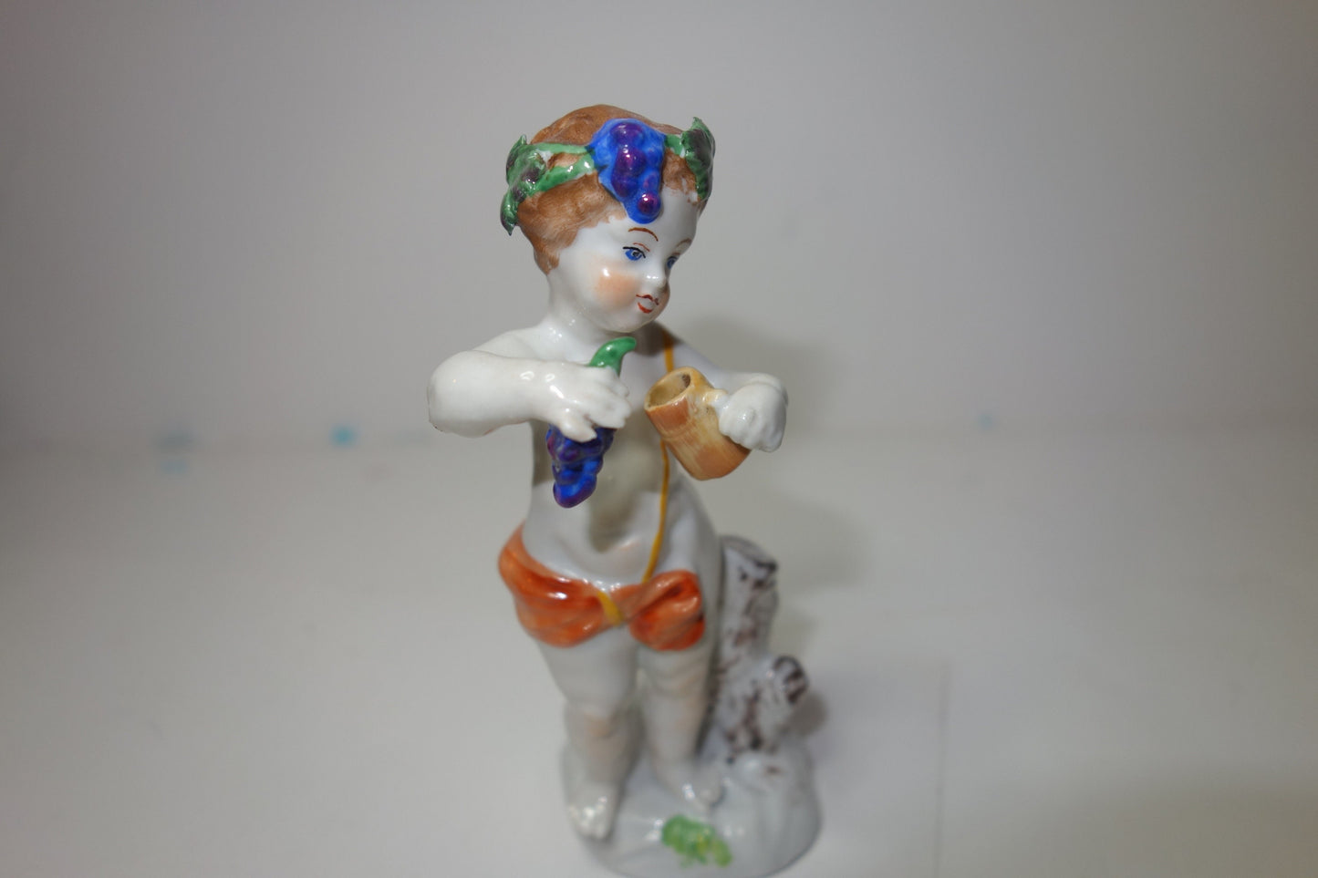 19th century German figure of the boy Bacchus