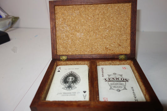 Cork lined playing card box with vintage cards