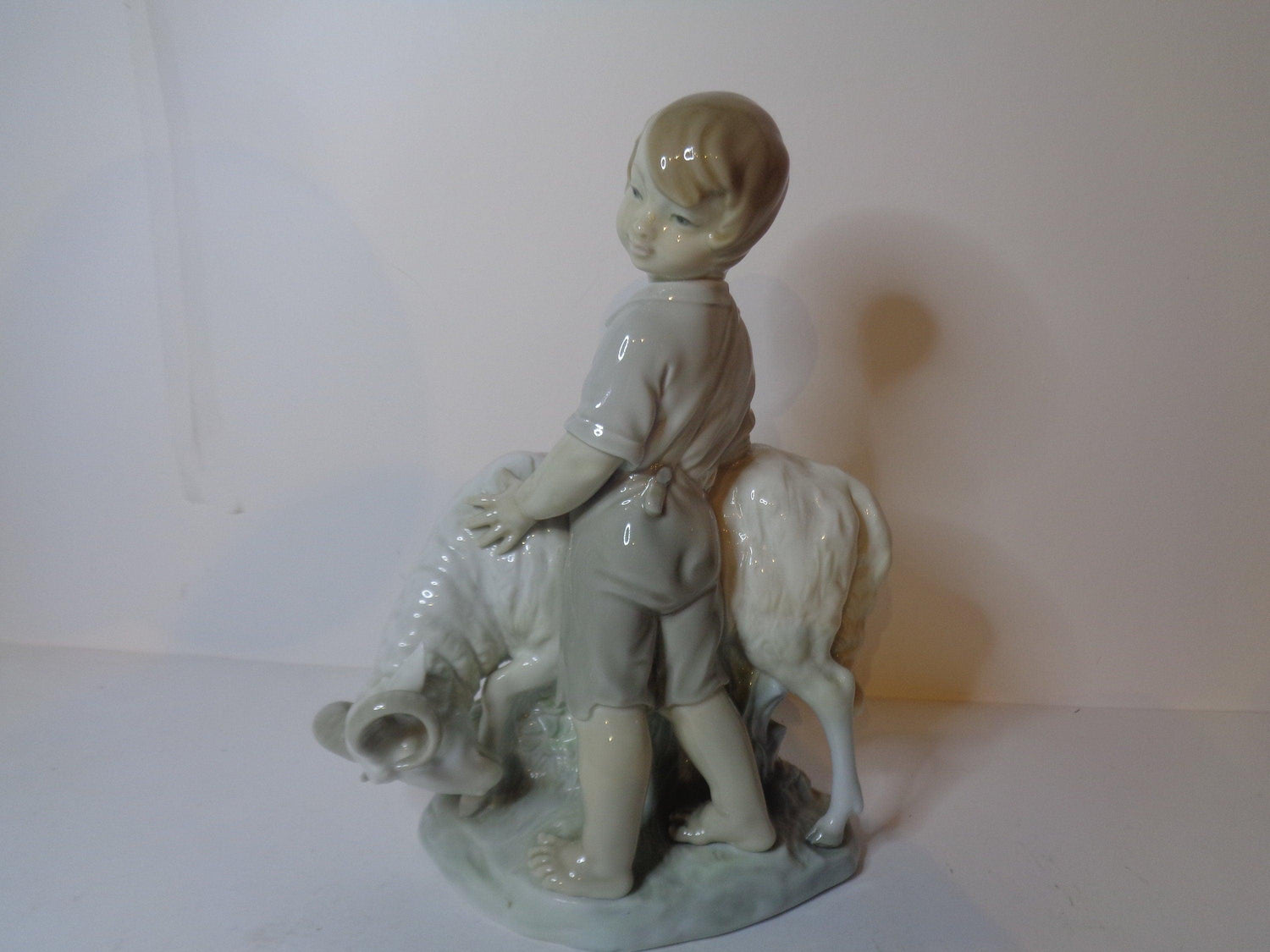 NAO by Lladro Boy with Ram impressed marks