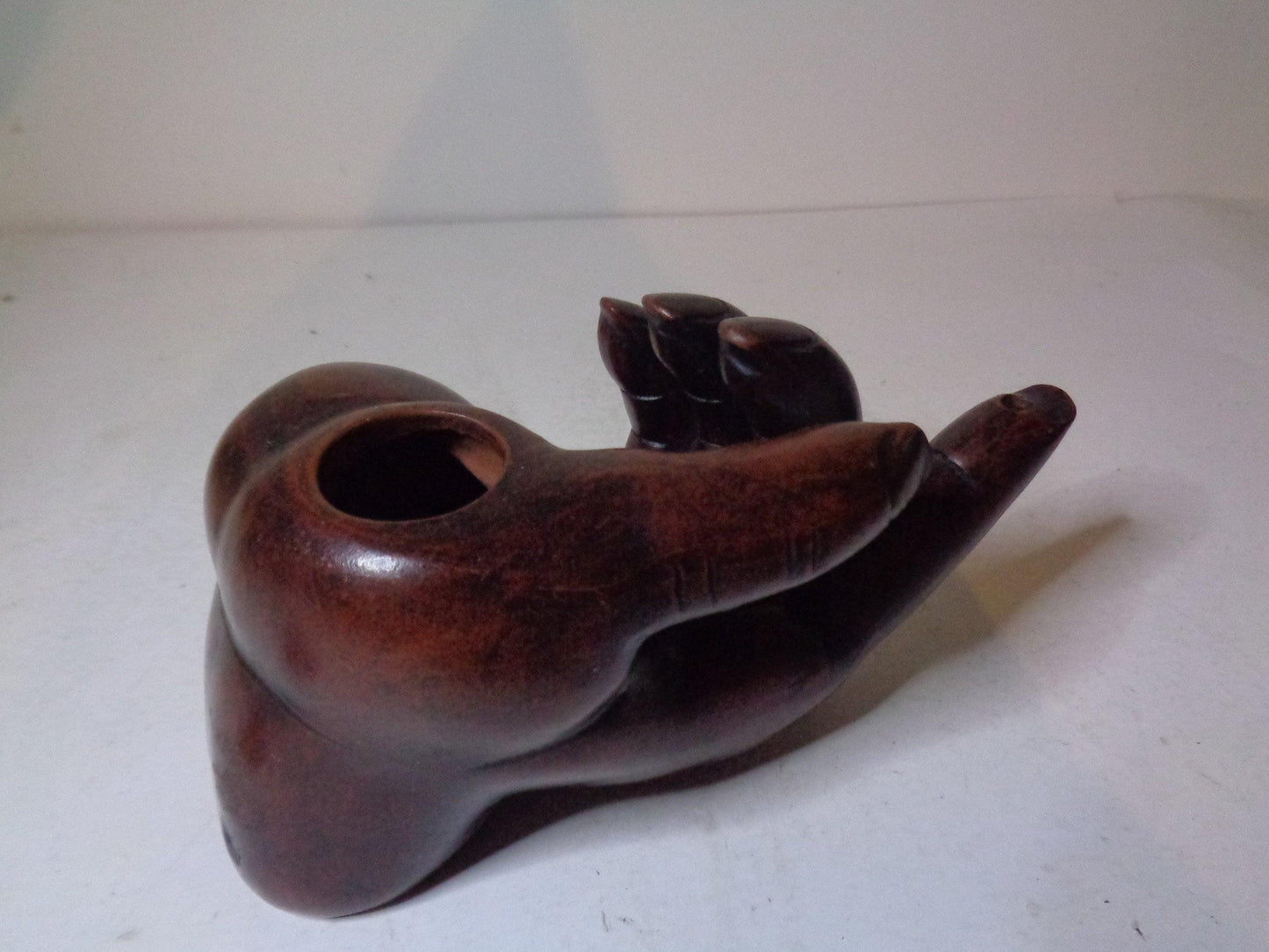 Oil lamp in the form of a hand