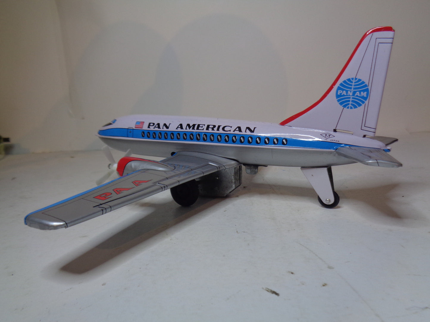 Pan American Twin Prop Tinplate Friction Plane by TT Toys Japan