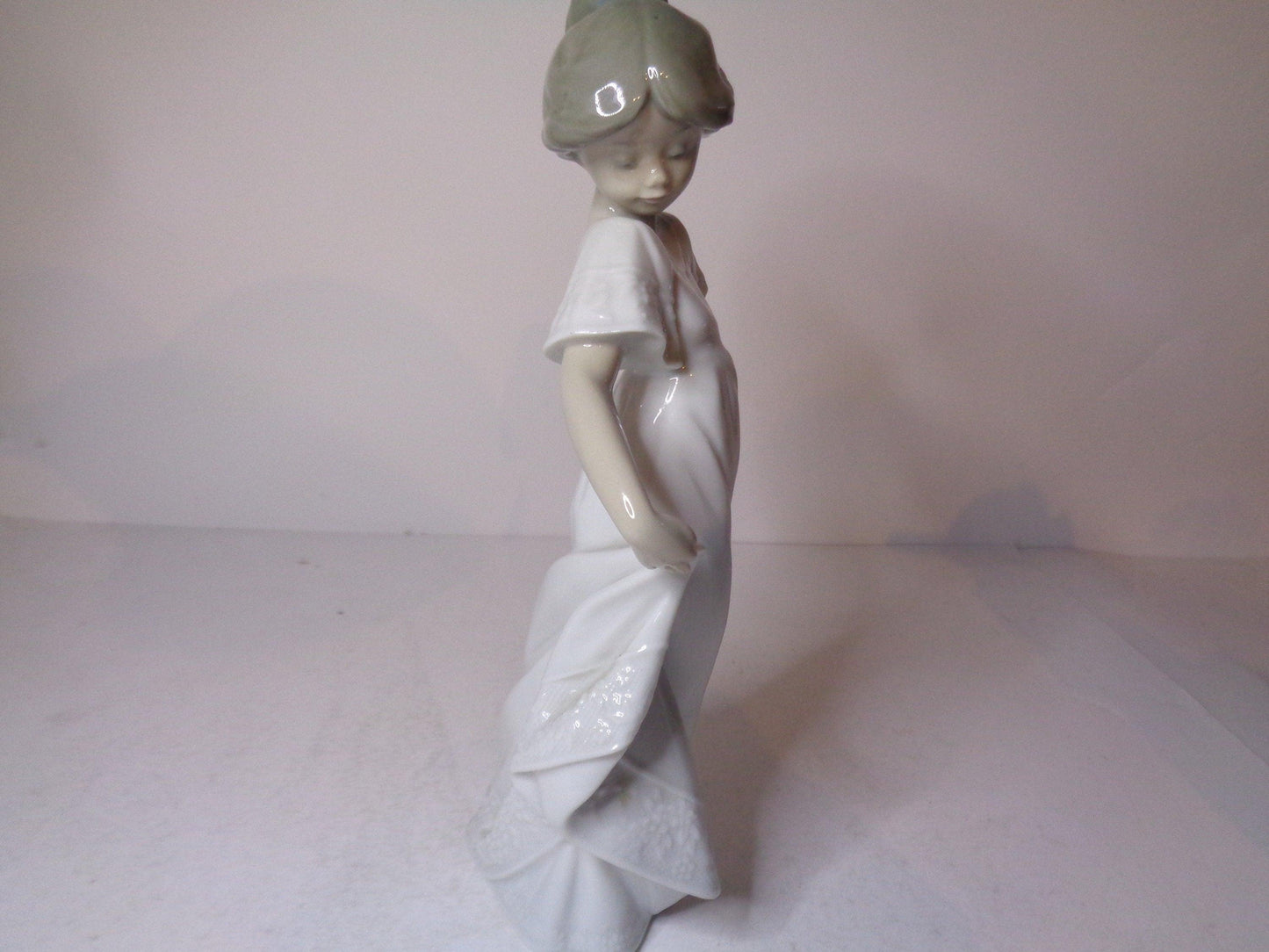 NAO by Lladro Young Girl twirling in her lovely dress