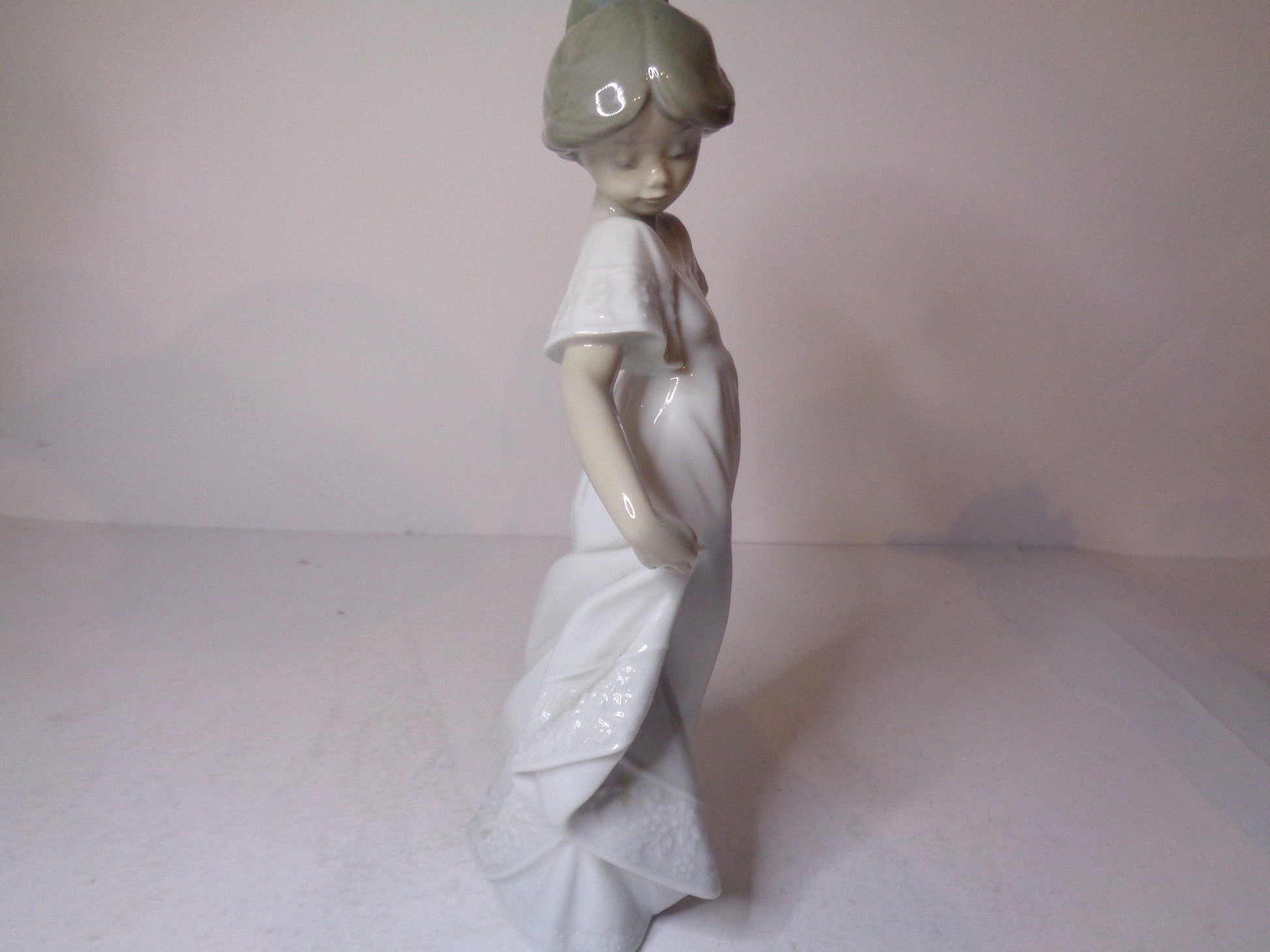 NAO by Lladro Young Girl twirling in her lovely dress