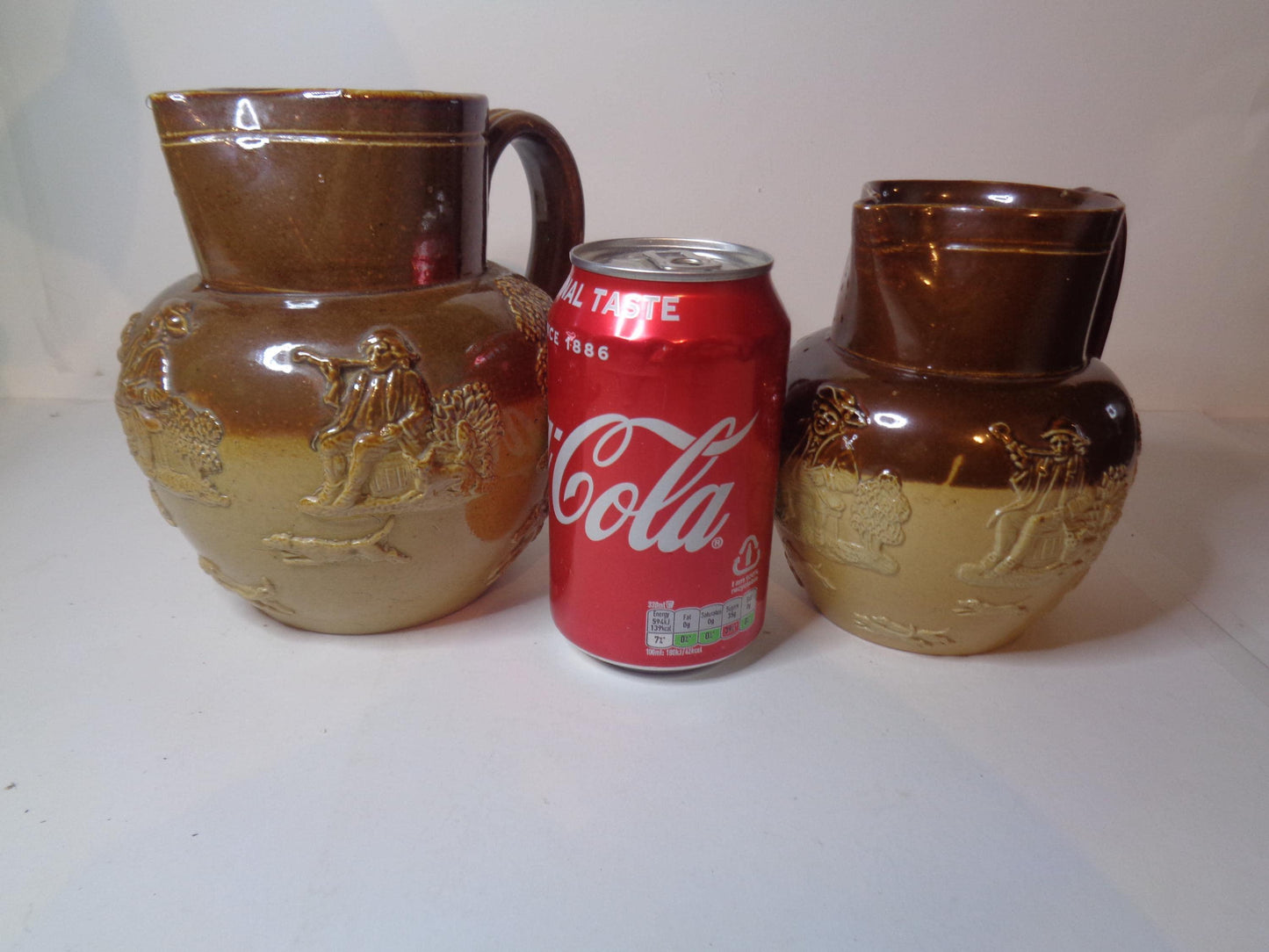 Doulton Lambeth Pair Salt Glazed Harvest Pattern Jugs