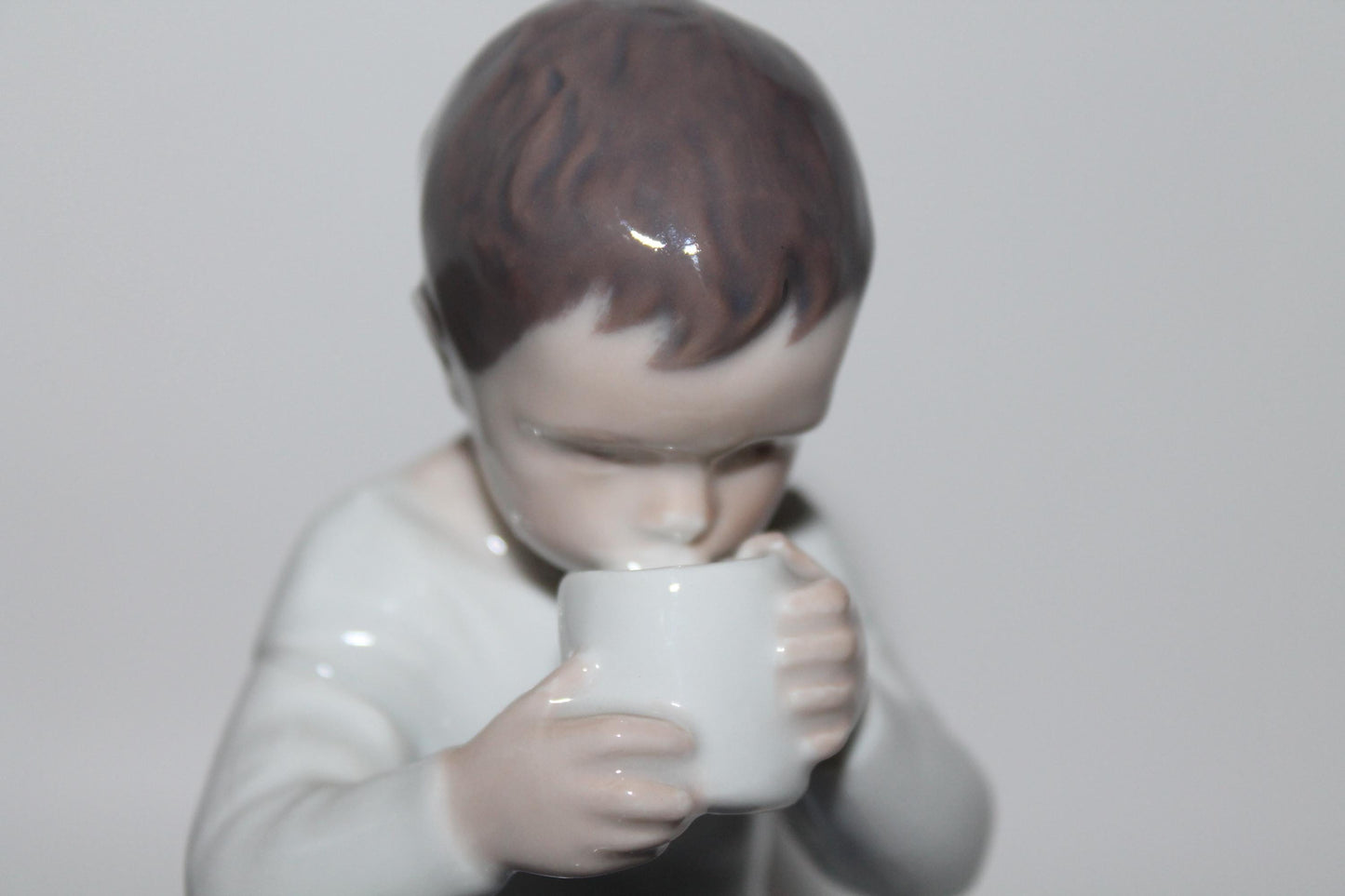 Royal Copenhagen Bing and Grondahl Victor Boy Drinking Milk No 1713