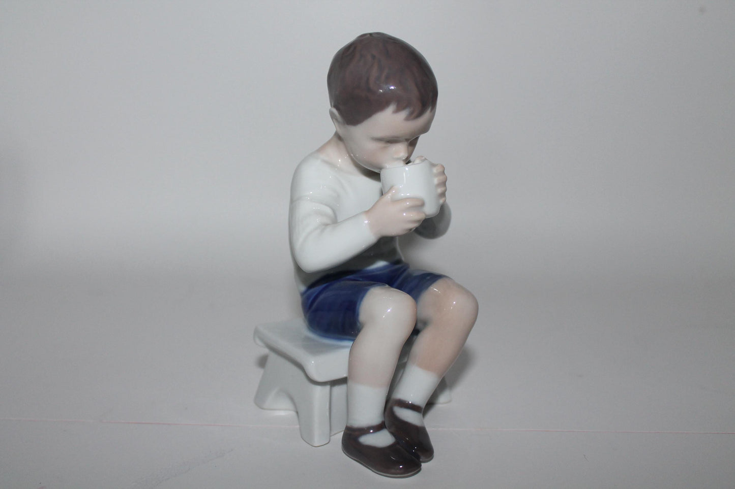 Royal Copenhagen Bing and Grondahl Victor Boy Drinking Milk No 1713