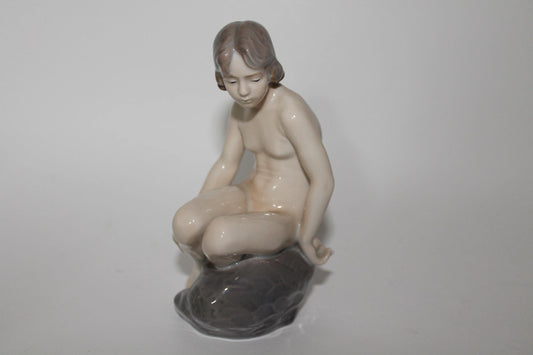 Royal Copenhagen Girl On Rock No 4027