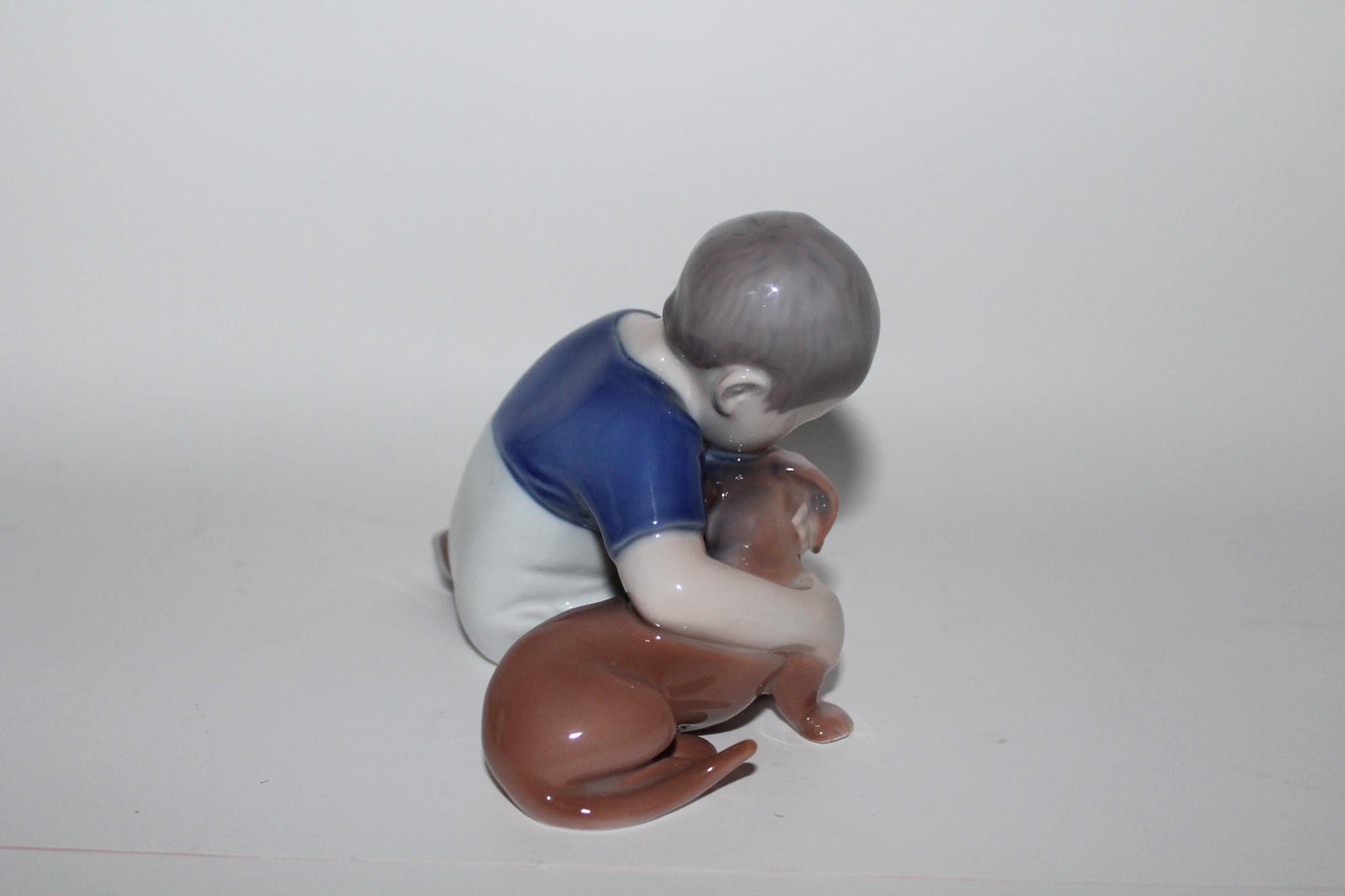 Royal Copenhagen Bing and Grondahl Boy with Dachshund No 1951