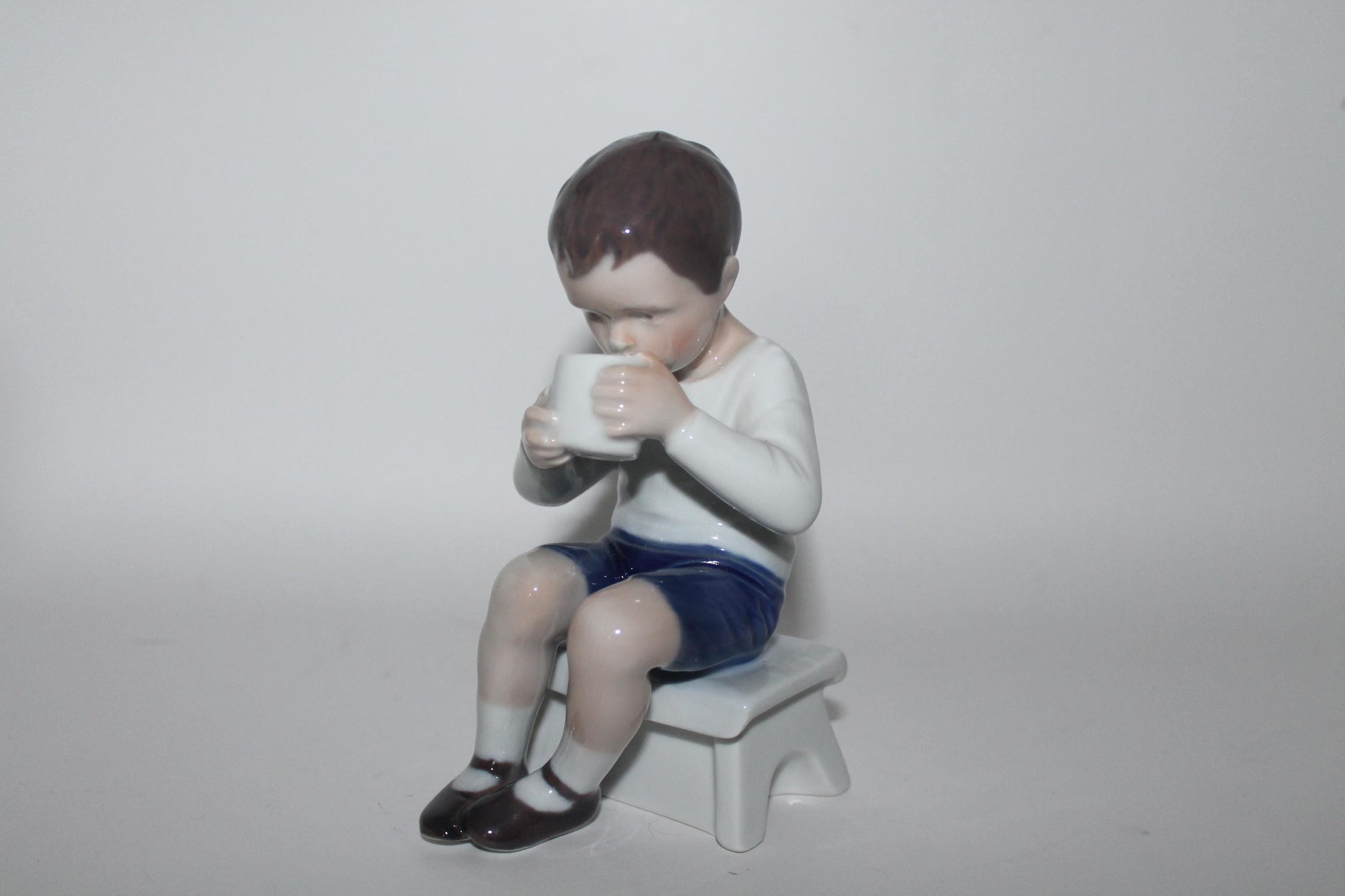 Royal Copenhagen Bing and Grondahl Victor Boy Drinking Milk No 1713