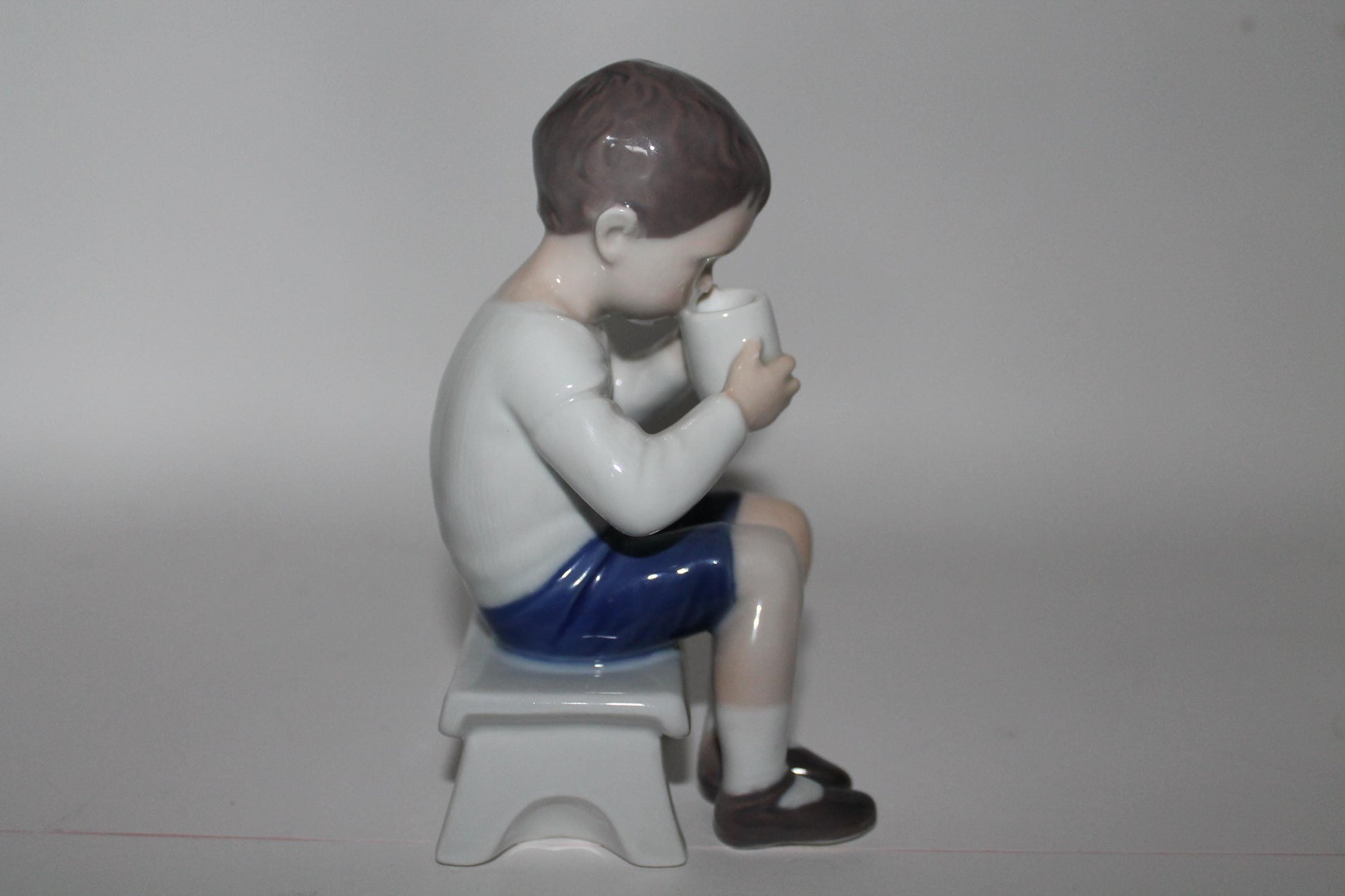 Royal Copenhagen Bing and Grondahl Victor Boy Drinking Milk No 1713