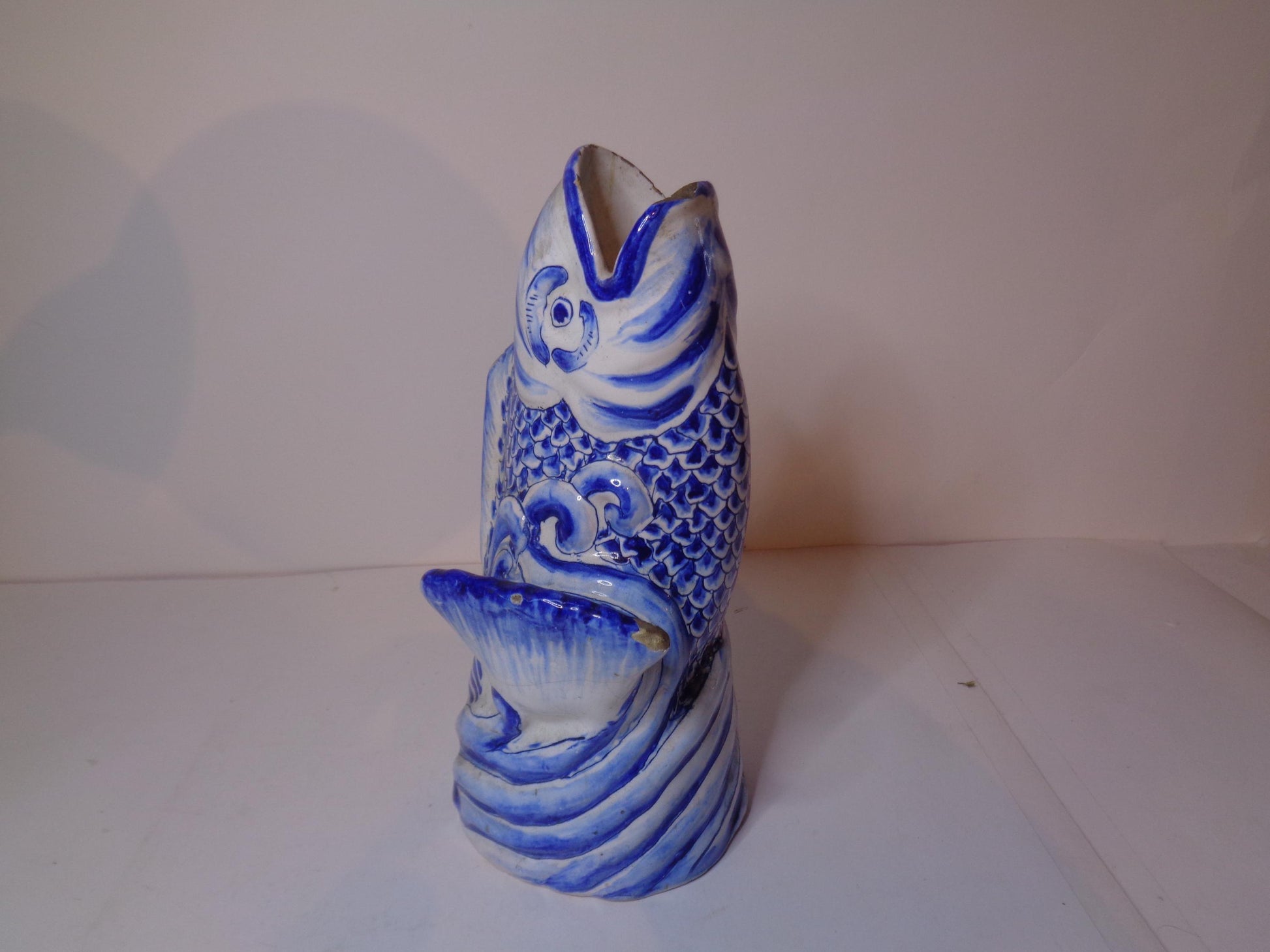 Antique Delft blue and white tin glazed leaping fish vase