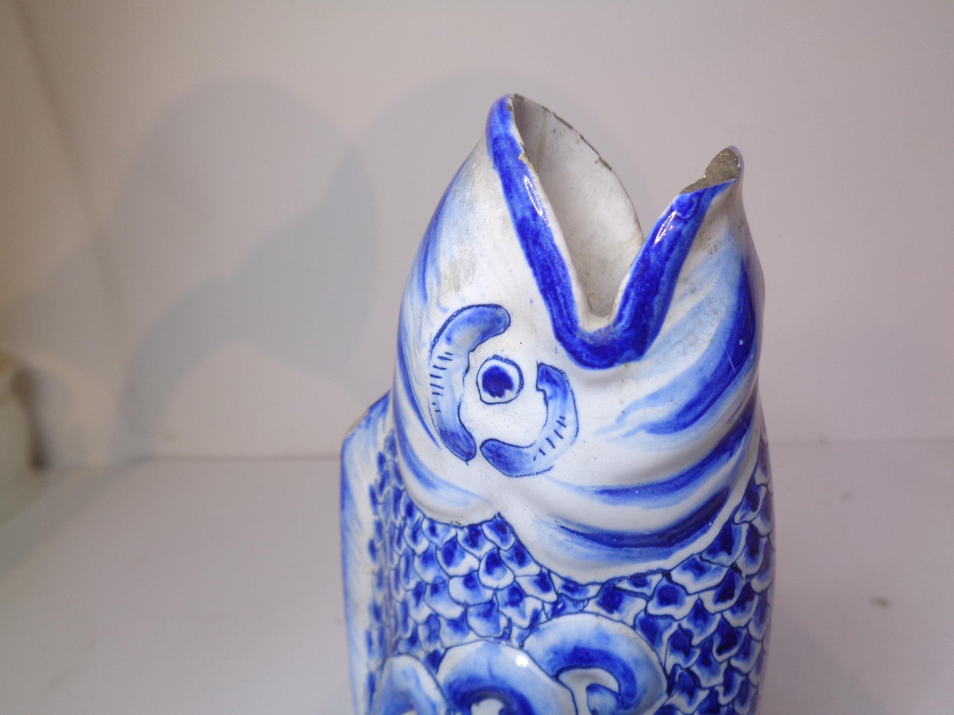 Antique Delft blue and white tin glazed leaping fish vase