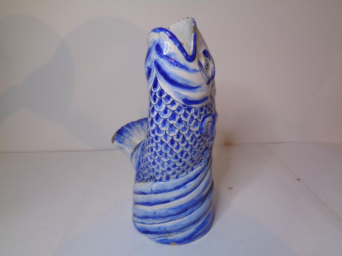 Antique Delft blue and white tin glazed leaping fish vase