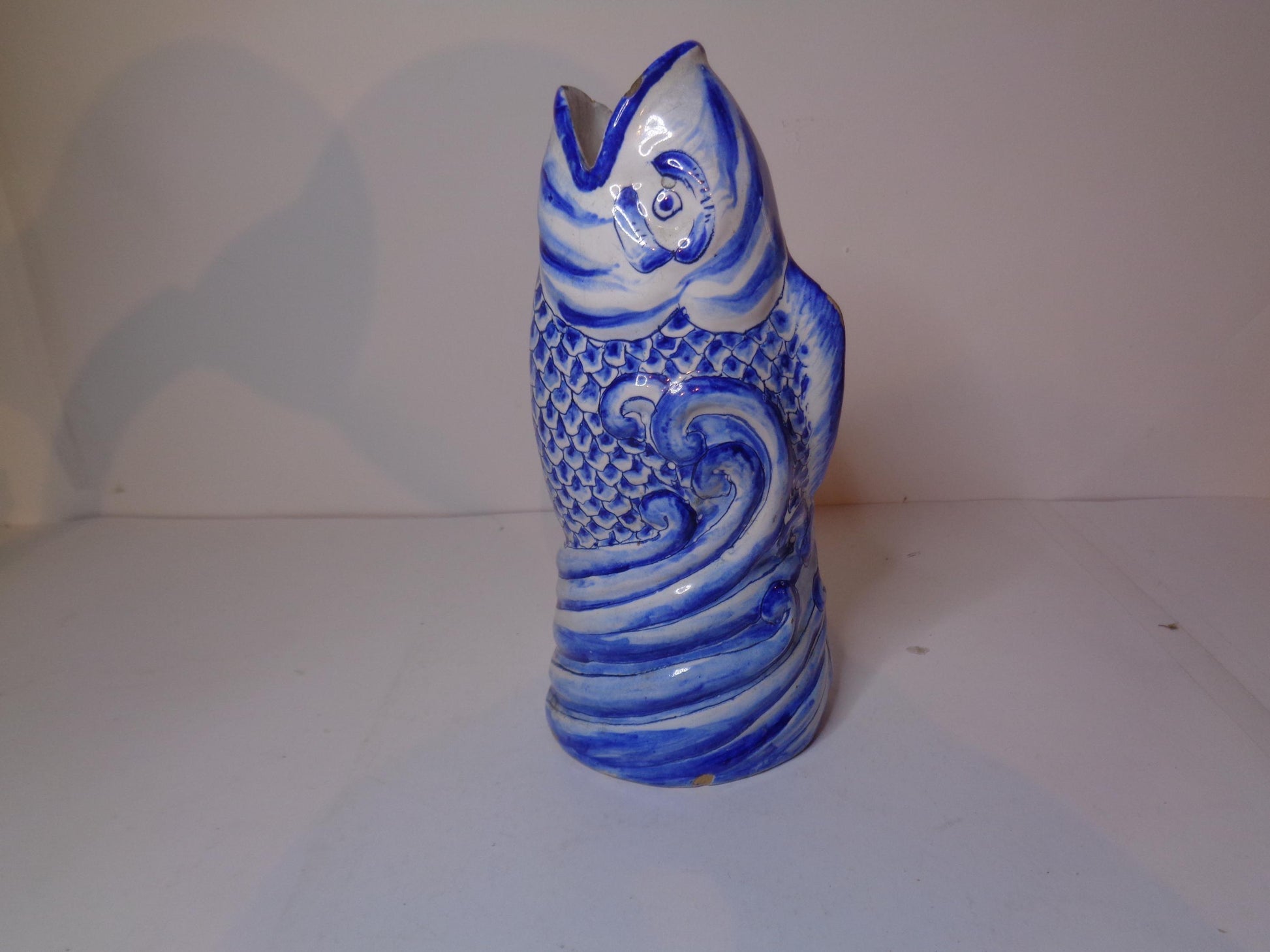 Antique Delft blue and white tin glazed leaping fish vase