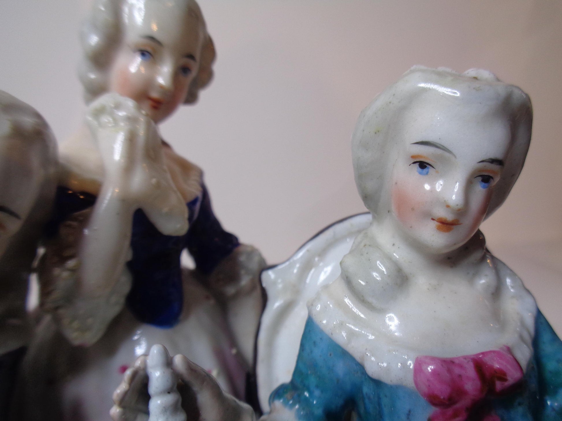 Dresden porcelain figure group featuring a gentleman and lady playing chess