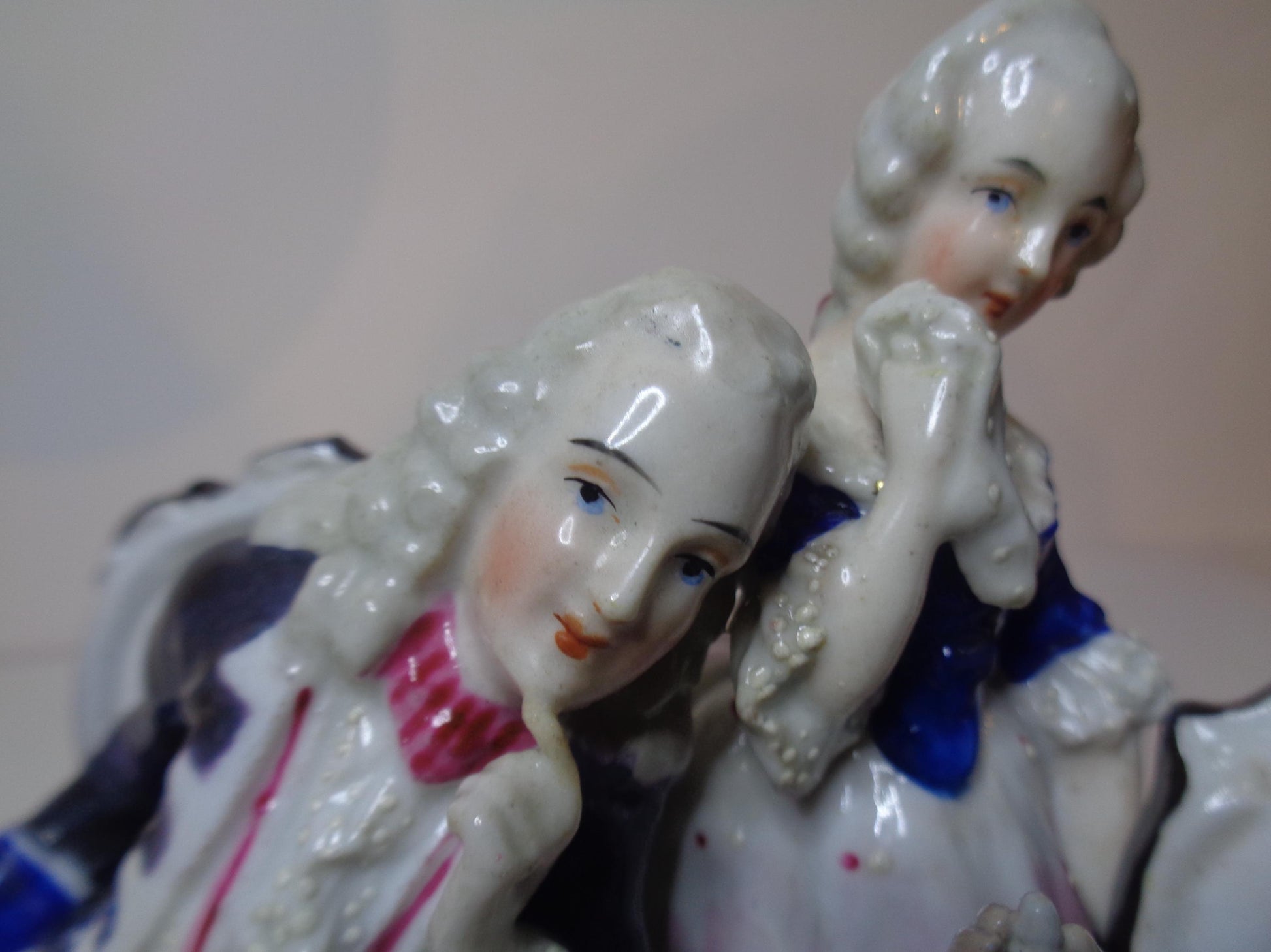 Dresden porcelain figure group featuring a gentleman and lady playing chess