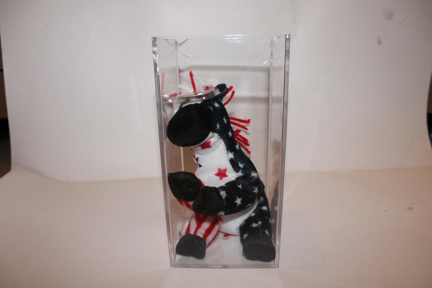 Ty Lefty 2000™ Beanie baby in damaged storage box