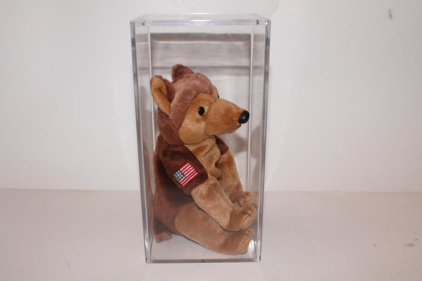 Ty Courage™ Beanie baby in storage box