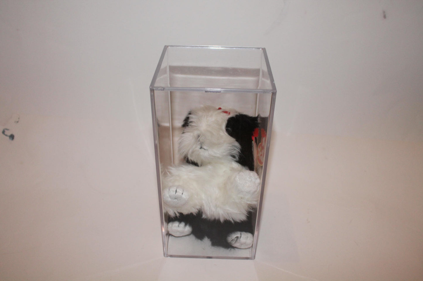 Ty Poofie™ Beanie baby in storage box