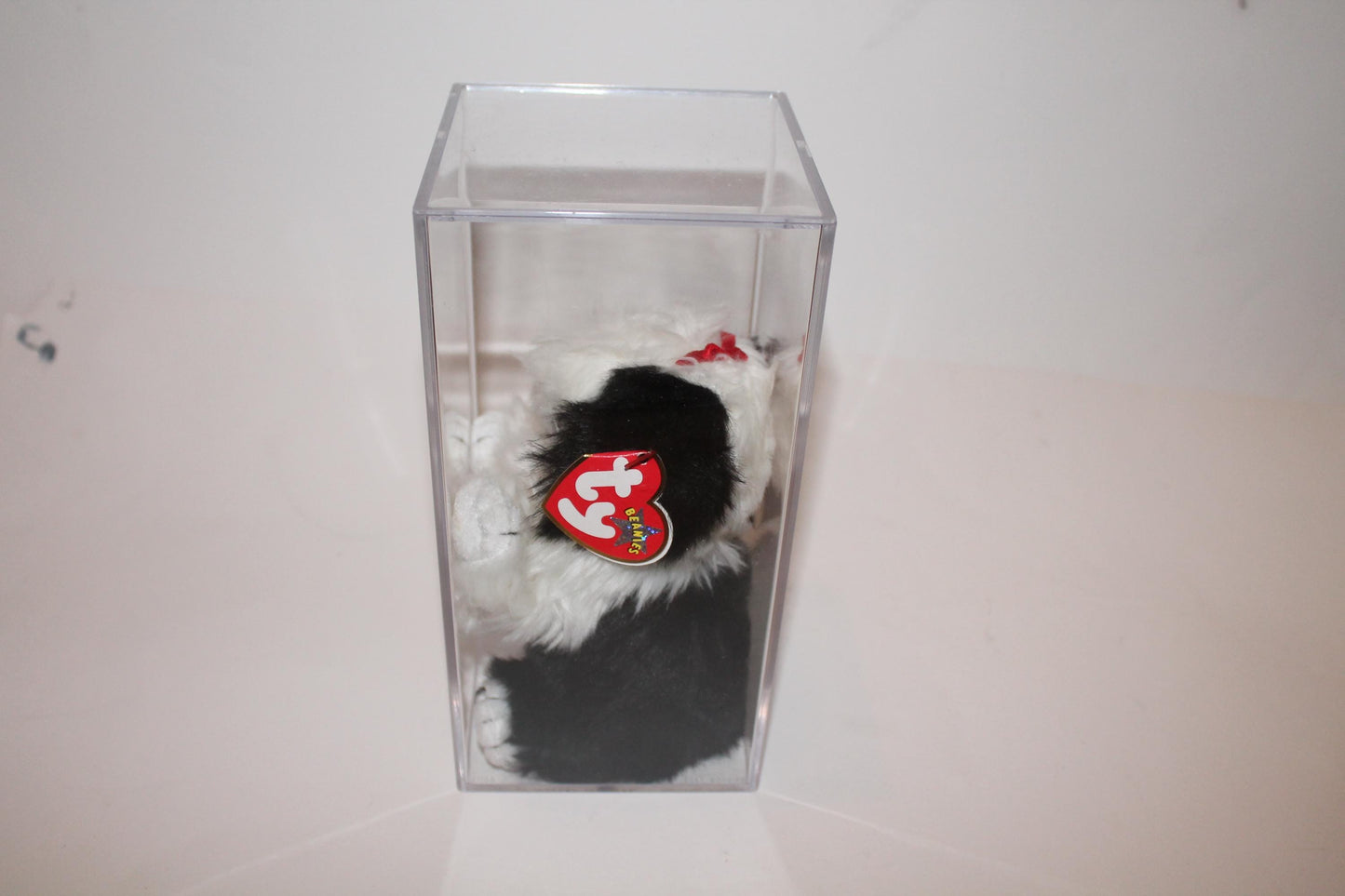 Ty Poofie™ Beanie baby in storage box