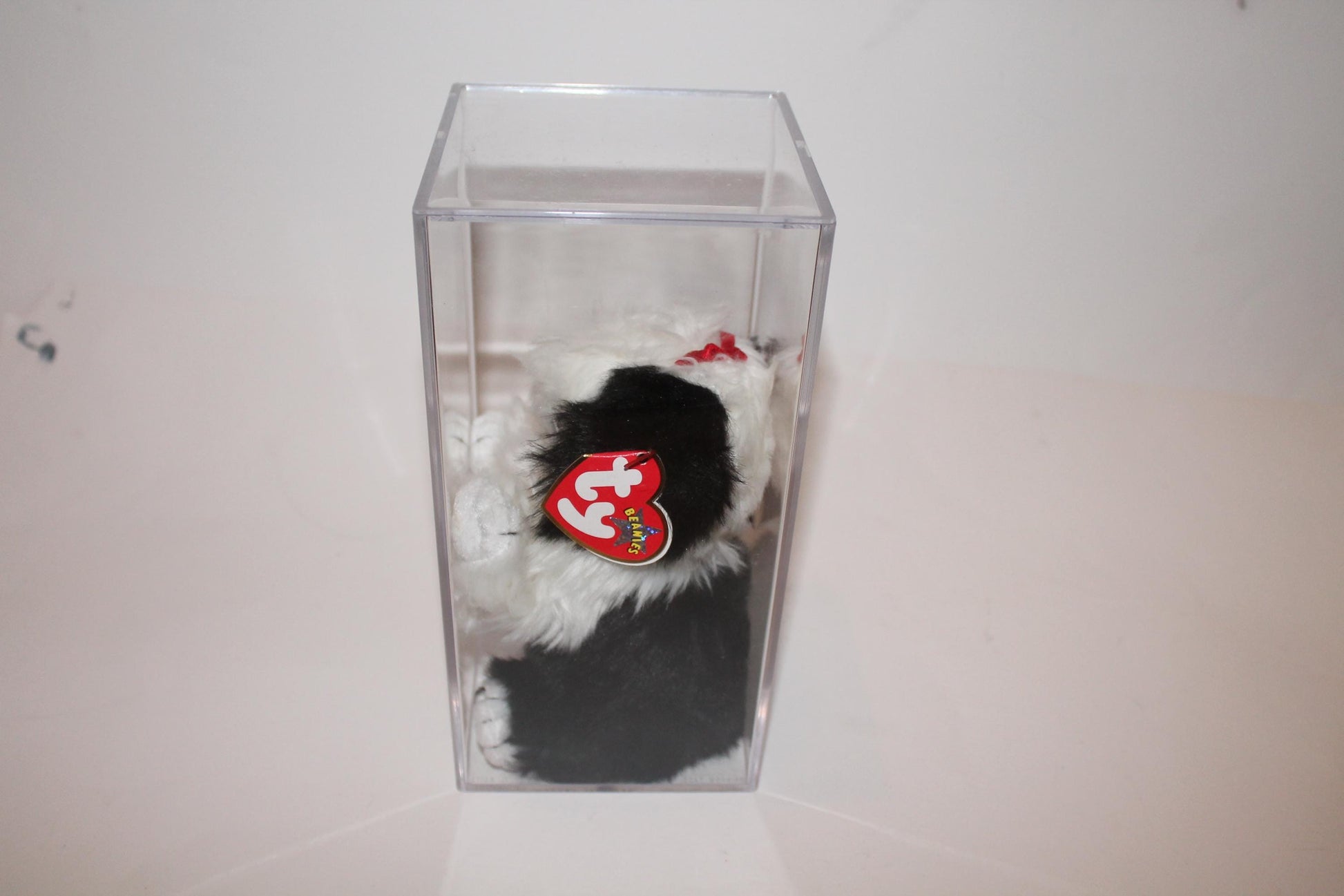 Ty Poofie™ Beanie baby in storage box