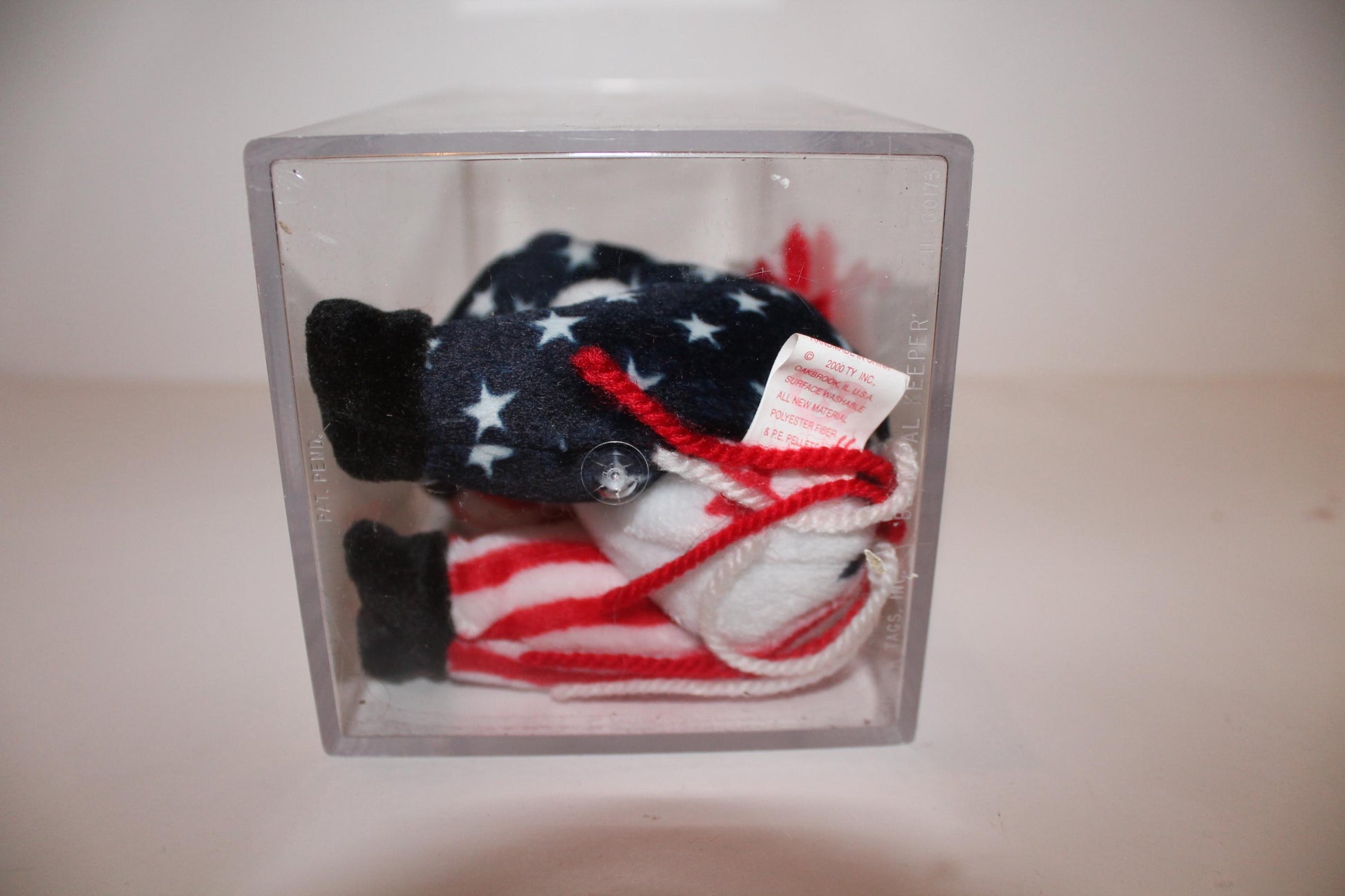 Ty Lefty 2000™ Beanie baby in damaged storage box