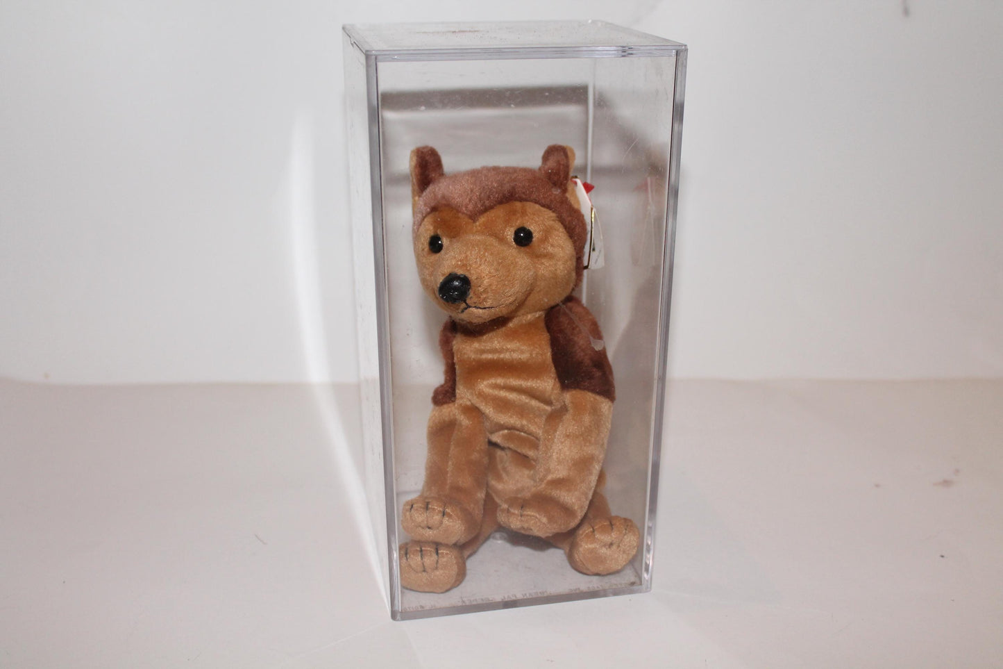 Ty Courage™ Beanie baby in storage box